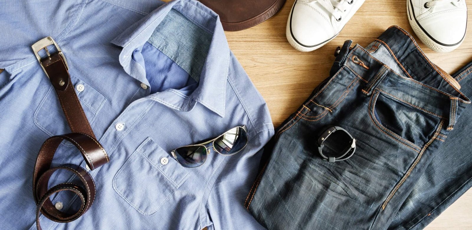 Maximizing sales: proven strategies for retail ecommerce success. flat lay of men casual fashion outfits on wooden b p8xwehx